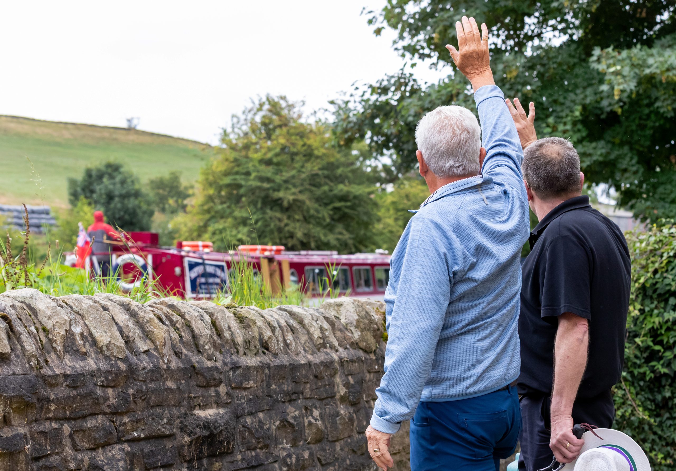 Waving at Canal Boat